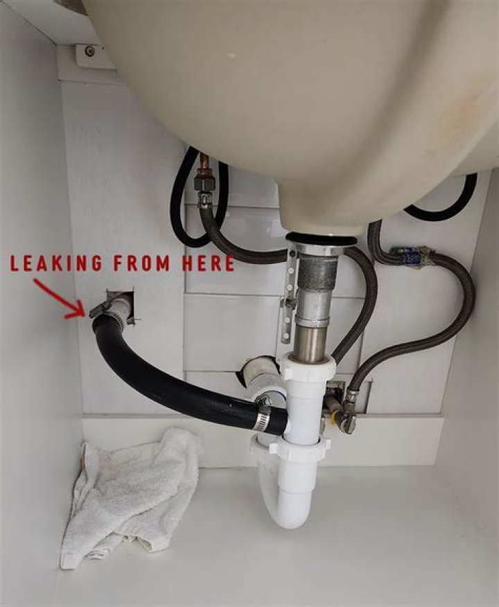 How do you clean AP trap under sink?