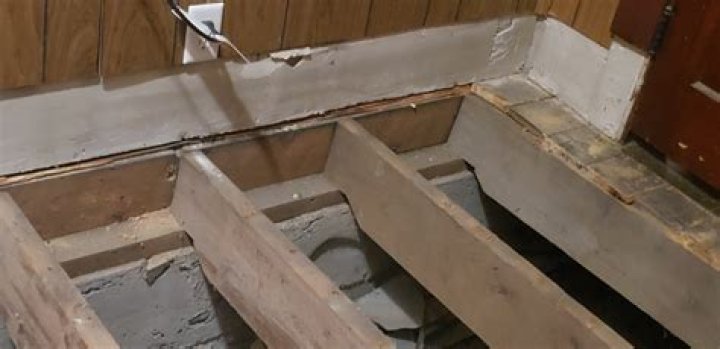 How do you reinforce notched floor joists?